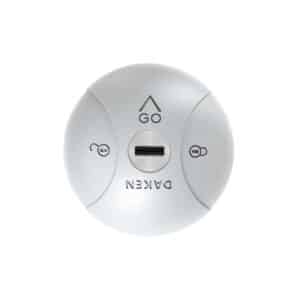 Close-up of a white circular device showing a central USB port and the GO and OPEN labels above and below it.