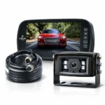 Car dash camera kit with a monitor, camera module, and coiled power cable on a white background, showing a red car image on the screen.